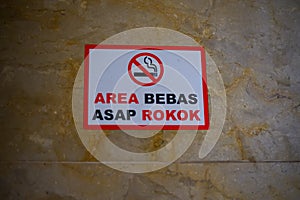 No smoking signs or smoke-free areas in public places