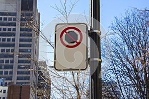 No stopping sign on a light standard