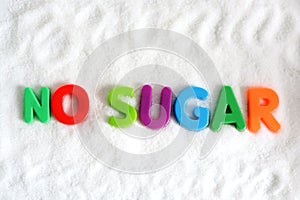 No sugar text on white refine sugar as background