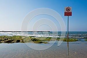 No swimming warning sign, Hebrew, Arabic, English, Tel Aviv Isreal