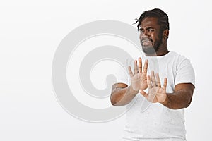 No thanks, I refuse. Portrait of displeased intense attractive african-american man with beard and moustache, pulling