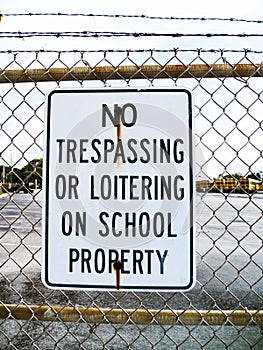 No Trespassing or Loitering on School Property Metal Sign