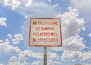 No Trespassing no dumping sign