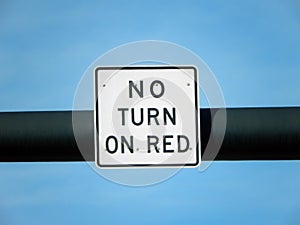 No turn on red sign over a blue sky