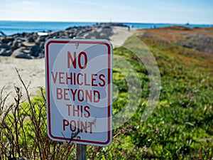 No vehicles beyond this point protecting a beach and sand nature pathway