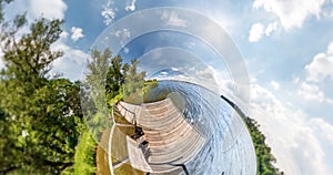 NO VR. Curvature of space of little planet transformation. Abstract torsion and spinning of full flyby panorama landscape pier nea