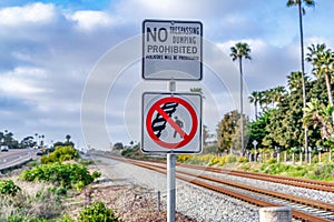 No Walking on Railway sign and No Trespassing and Dumping sign in San Diego CA