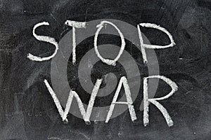 No war, handwritten with a chalk on the blackboard photo