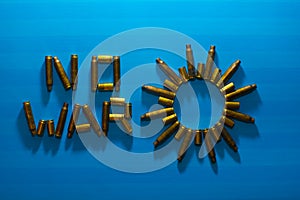 No War Stop War Message  Blue background with drop shadow - Concept of stop ongoing conflicts in the world using bullets t