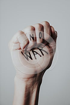 No war written in a raised fist