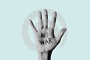 No war written in a raised hand