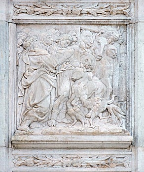 The Noah exits the ark, relief on portal of Saint Petronius Basilica in Bologna photo