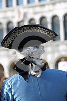 noble man with wig and hat in the Piazza San Marco in Venice