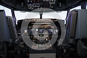 Nobody in airplane cabin with dashboard command and control panel