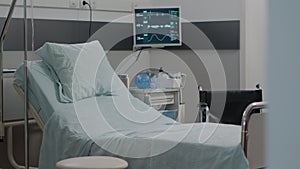 Nobody in hospital ward bed with medical equipment
