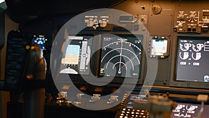 Nobody in plane cabin with control panel and navigation compass