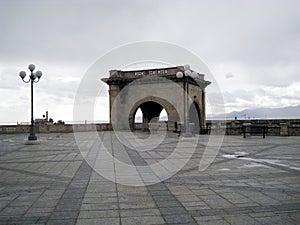 nobody in the square at the top of the rampart with a predominance of gray cloudy sky