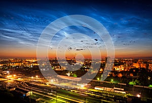 Noctilucent clouds over Yekaterinburg city downtown at summer night