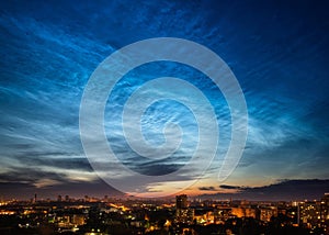 Noctilucent clouds over Yekaterinburg city downtown at summer night