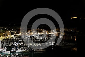 Nocturnal Elegance of Porto Ercole: Moonlit Tranquility on Argentario\'s Shores