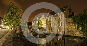 Nocturnal view of a canal in Bruges photo