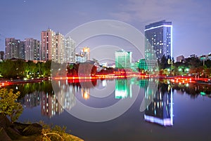 Nocturne view of the lake in the Yantan Park in Lanzhou (China) photo