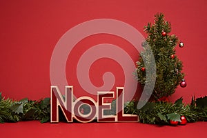 Noel sign and Christmas tree