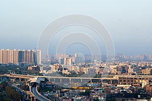 Noida Delhi cityscape with buildings and metro station photo