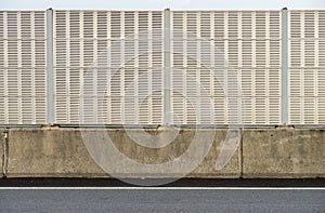Noise barrier wall beside the highway