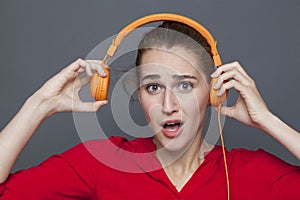 Noisy headphones concept for beautiful 20s girl