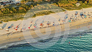 Nokomis, Florida. Sandy beach in Sarasota county, USA. Many people enjoying vacation time bathing in warm gulf water and