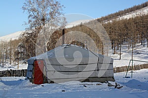 A nomadic family lives alone in the tranquil Bogd Khaan valley, Mongolia.