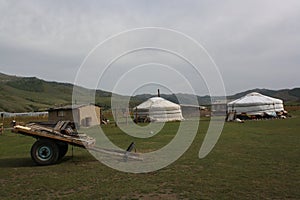 Nomadic tents and cart in Tunkhel steppe, Selenge, Mongolia.