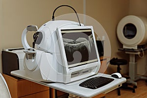 Non-contact optical coherence tomograph for visualization of the anterior and posterior segments of the eyeball. Medical equipment