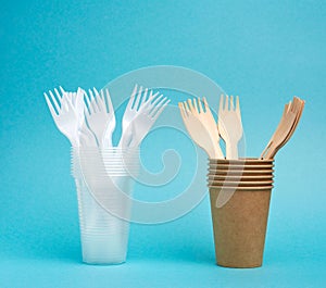Non-degradable plastic cups and fork from disposable tableware and a set of dishes from environmental recycled materials