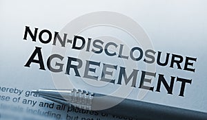 Non disclosure agreement document with pen close-up