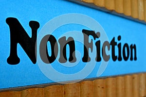Non Fiction Blue Sign Background photo