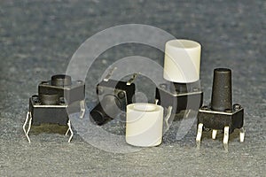 Non-locking multi-frequency electric buttons