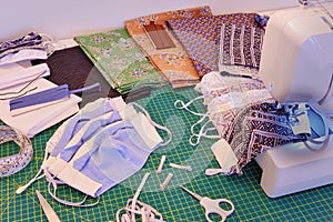 Non-medical fabric mask production laid-out on table