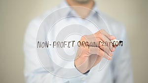 Non Profit Organization, Man writing on transparent screen photo