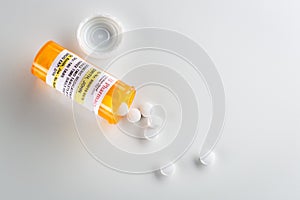 Non-Proprietary Medicine Prescription Bottle and Spilled Pills