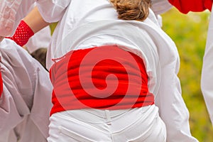 Non-recognizable people doing Castellers or Torre Humana photo