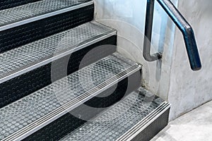 Non-slip stairs with dot pattern close up for background.