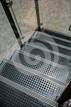 Non-slip stairs with dot pattern close up for background.