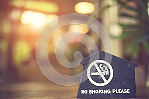 Non smoking sign on a table in a cafe