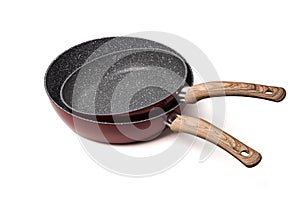 Non stick frying pans isolated on white background