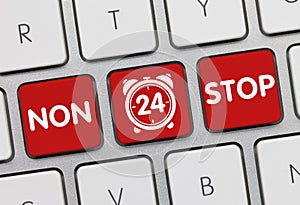 NON STOP 24H. - Inscription on Red Keyboard Key