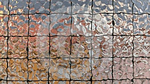 Non-transparent reinforced glass on the balcony of an apartment on the second floor