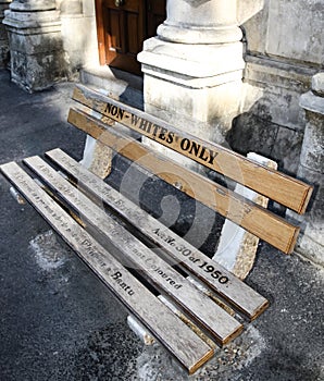 Non whites only -  old bench with an inscription left as  memory of apartheid, racism and segregation