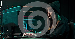 Nonconformist Teenage Hacker Girl Using Computer for Attacking Corporate Servers with malware